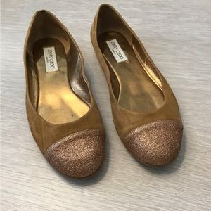 Flats from Jimmy Choo. Worn a few times. Runs 1/2 size smaller